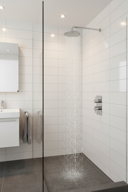 Concealed thermostatic shower valve with overhead rain shower head in modern bathroom setting
